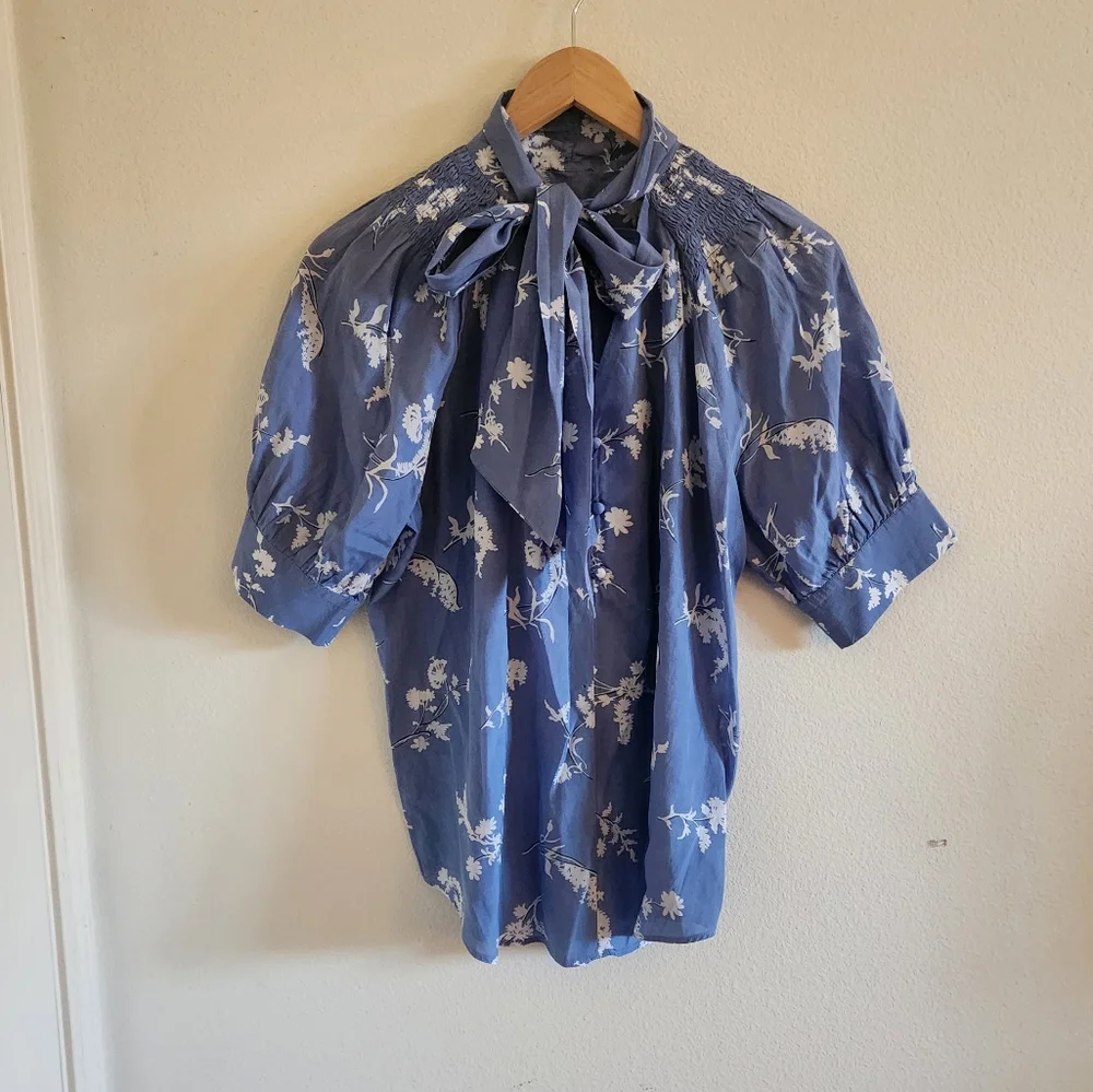 Blue and white floral top with bow and buttons - Picture 1 of 4